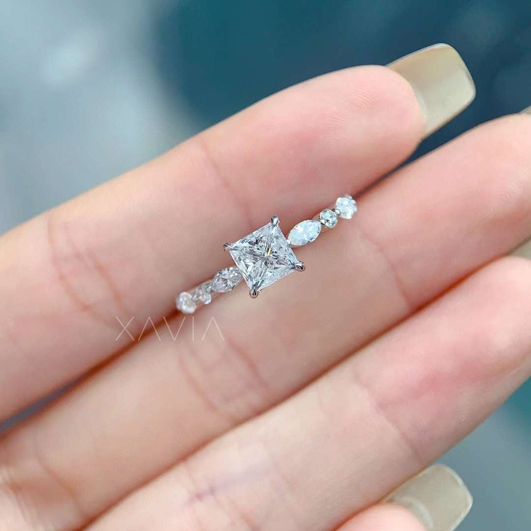top view of lab-grown princess cut diamond ring with marquise detailing